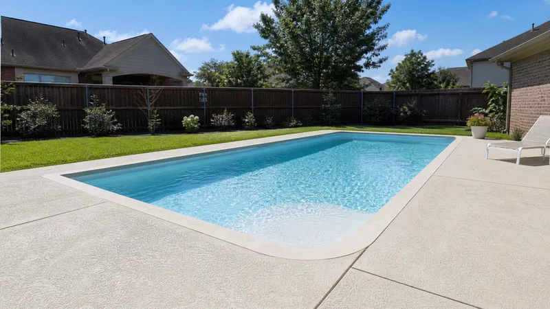 Affordable inground pool with simple deck built in Houston TX