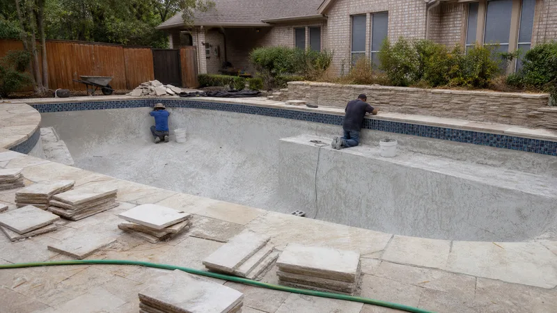 Pool remodeling project with new plaster and tile in Houston