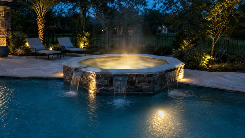 Gunite pool and raised spa combo with spillover in Houston Texas